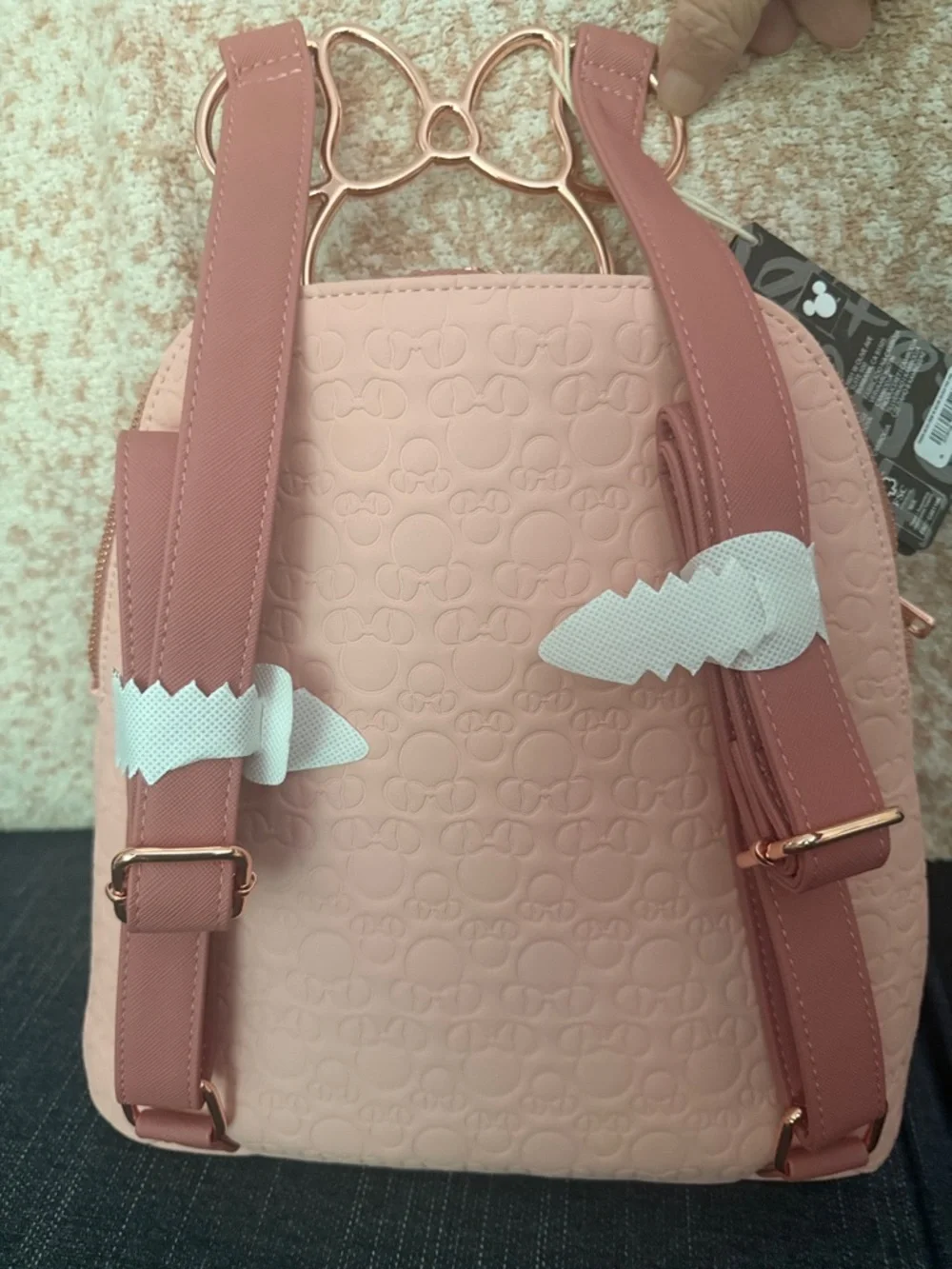 Loungefly Minnie Mouse Embossed Pink Mini Backpack with Rose Gold Bow